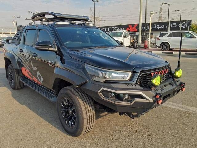 Подержанный Toyota Hilux VIII Рестайлинг, 2.8 л, 2023 в Дубае от SONDOS MOTORS FZE Черный цвет. Other | AUTO.AE