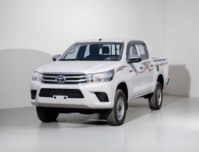 New Toyota Hilux VIII, 2.4 l, 2026 in Dubai by Global Motors, White color. GCC Specs | AUTO.AE
