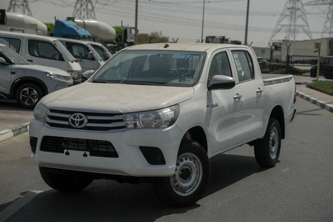 New Toyota Hilux VIII, 2.4 l, 2026 in Dubai by Global Motors, White color. GCC Specs | AUTO.AE