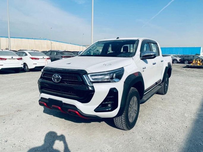 New Toyota Hilux VIII Facelift, 4.0 l, 2025 in Dubai by Global Motors, White color. GCC Specs | AUTO.AE