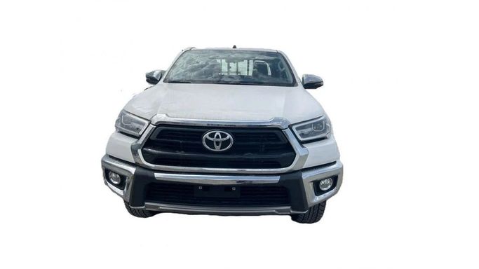 New Toyota Hilux VIII Facelift, 2.7 l, 2024 in Dubai by RMG Automobiles, White color. GCC Specs | AUTO.AE | Listing #237349