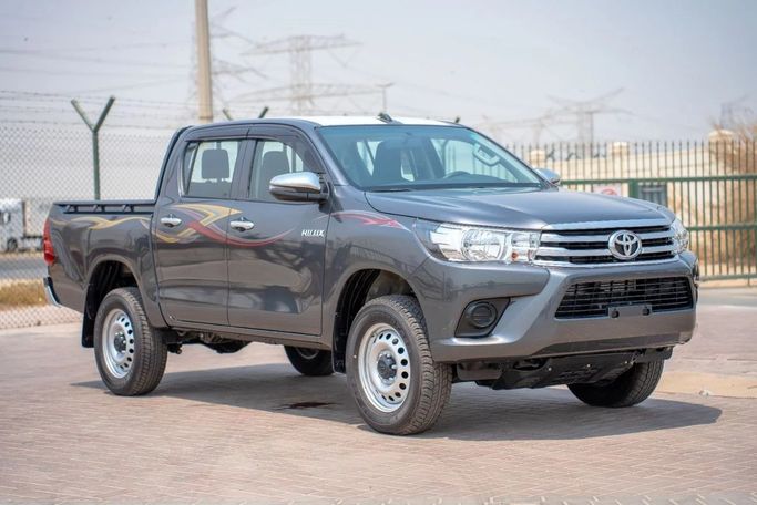 New Toyota Hilux VIII, 2.4 l, 2025 in Dubai by Hussein Ghulam Motors FZCO, Grey color. GCC Specs | AUTO.AE