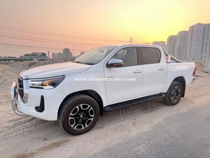 مستعملة Toyota Hilux ثامناً, 2.8 l, 2023 في في دبي من Alhamd Motors، اللون أبيض.  | AUTO.AE | إعلان #260556