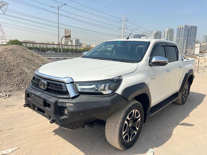 Подержанный Toyota Hilux VIII Рестайлинг, 2.8 л, 2021 в Дубае от Alhamd Motors Белый цвет.  | AUTO.AE | Объявление #260558