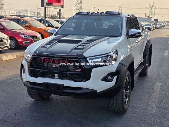 مستعملة Toyota Hilux ثامناً, 2.8 l, 2021 في في دبي من Alhamd Motors، اللون أبيض.  | AUTO.AE | إعلان #260559