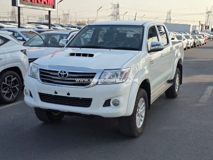 Used Toyota Hilux VII Facelift, 3.0 l, 2014 in Dubai by Alhamd Motors, White color.  | AUTO.AE | Listing #260736