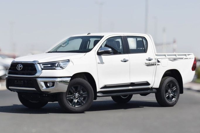 New Toyota Hilux VIII Facelift, 4.0 l, 2025 in Dubai by TARGET MOTORS FZE, White color. GCC Specs | AUTO.AE | Listing #270152
