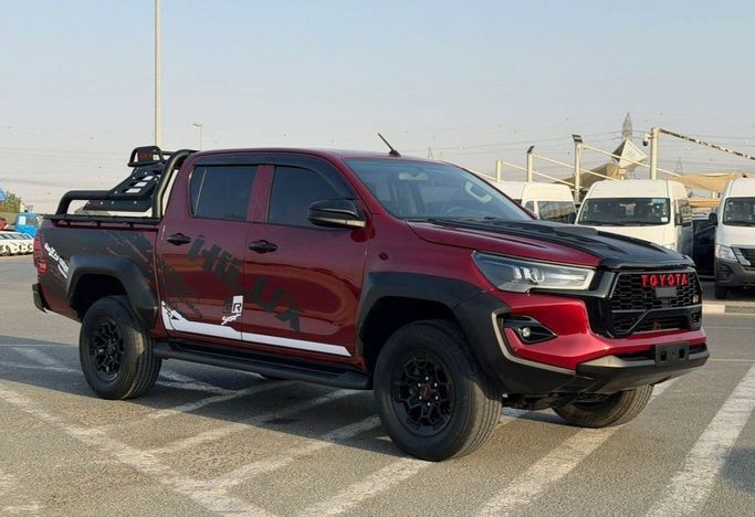 Подержанный Toyota Hilux VIII Рестайлинг, 2.7 л, 2022 в Дубае от SIKANDAR MOTORS Красный цвет. GCC | AUTO.AE | Объявление #270181