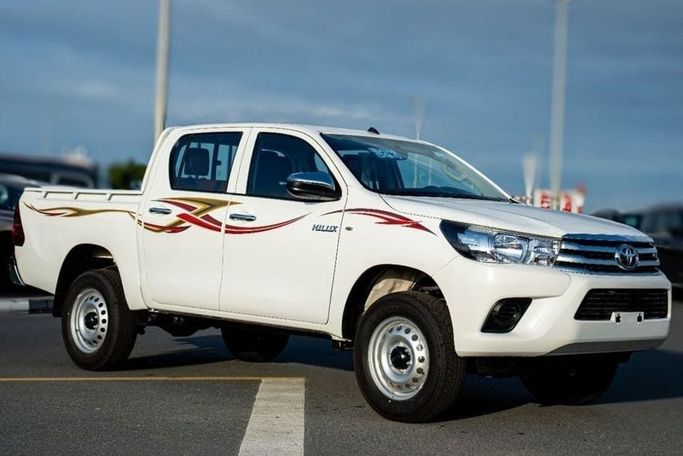 Новый Toyota Hilux VIII, 2.4 л, 2026 в ОАЭ, Дубай от Hussein Ghulam Motors FZCO Белый цвет. GCC | AUTO.AE | Объявление #278251