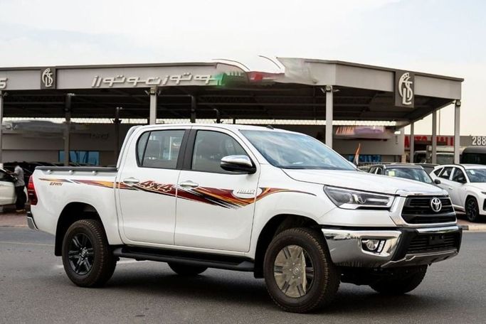 Новый Toyota Hilux VIII Рестайлинг, 2.7 л, 2026 в ОАЭ, Дубай от Hussein Ghulam Motors FZCO Белый цвет. GCC | AUTO.AE | Объявление #278372