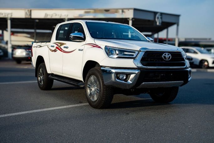 Новый Toyota Hilux VIII Рестайлинг, 2.7 л, 2026 в ОАЭ, Дубай от Hussein Ghulam Motors FZCO Белый цвет. GCC | AUTO.AE | Объявление #278428