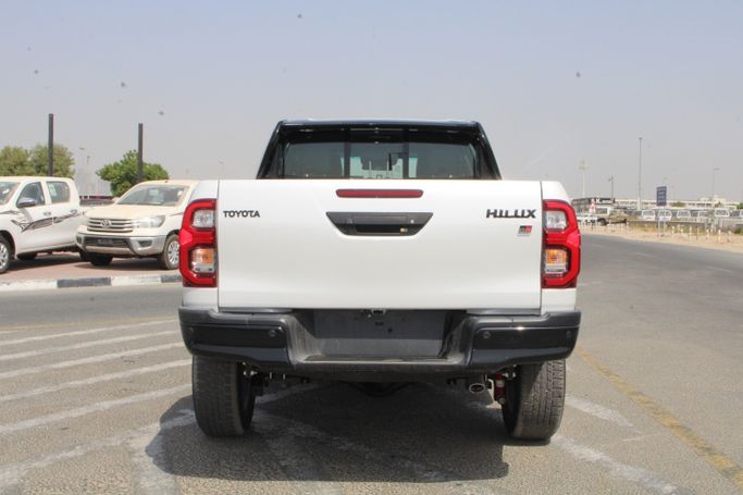 New Toyota Hilux VIII Facelift, 4.0 l, 2026 in UAE, Dubai by Wafrah Automotive Fzco, White color. GCC Specs | AUTO.AE | Listing #296308 — photo 4 of 25