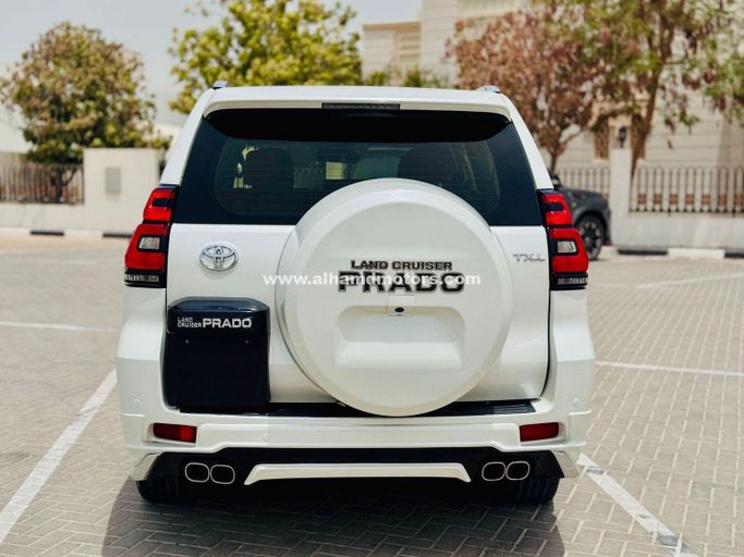 Used Toyota Land Cruiser Prado 150 Series Facelift 1, 2.7 l, 2013 in Dubai by Alhamd Motors, White color. GCC Specs | AUTO.AE