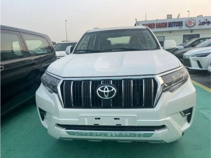 New Toyota Land Cruiser Prado 150 Series Facelift 3, 2.7 l, 2023 in Dubai by Mohamed Hakim Motors, White color. GCC Specs | AUTO.AE