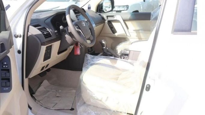 New Toyota Land Cruiser Prado 150 Series Facelift 3, 2.7 l, 2023 in Dubai by Mohamed Hakim Motors, White color. GCC Specs | AUTO.AE