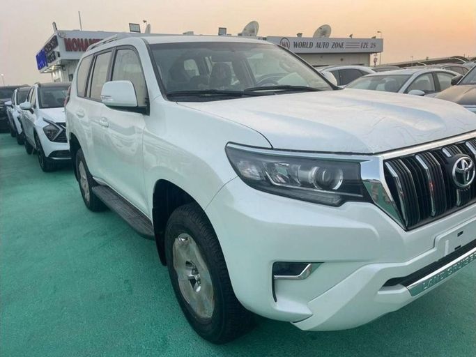 New Toyota Land Cruiser Prado 150 Series Facelift 3, 2.7 l, 2023 in Dubai by Mohamed Hakim Motors, White color. GCC Specs | AUTO.AE