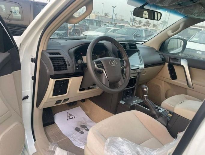 New Toyota Land Cruiser Prado 150 Series Facelift 3, 2.7 l, 2023 in Dubai by Mohamed Hakim Motors, White color. GCC Specs | AUTO.AE