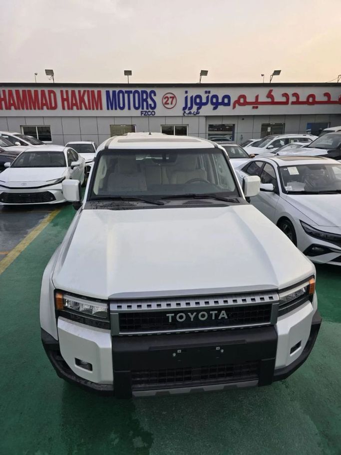 New Toyota Land Cruiser Prado 250 Series, 2.4 l, 2025 in Dubai by Mohamed Hakim Motors, White color. GCC Specs | AUTO.AE