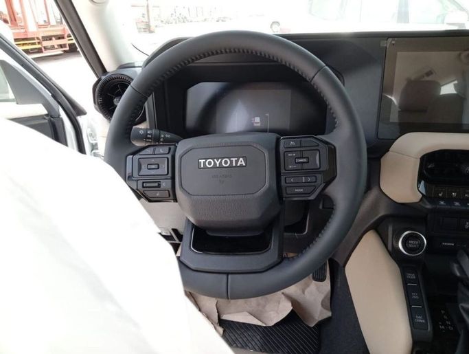 New Toyota Land Cruiser Prado 250 Series, 2.8 l, 2024 in Dubai by Mohamed Hakim Motors, White color. GCC Specs | AUTO.AE
