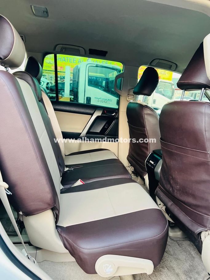 Used Toyota Land Cruiser Prado 150 Series, 2.7 l, 2012 in Dubai by Alhamd Motors, White color. GCC Specs | AUTO.AE