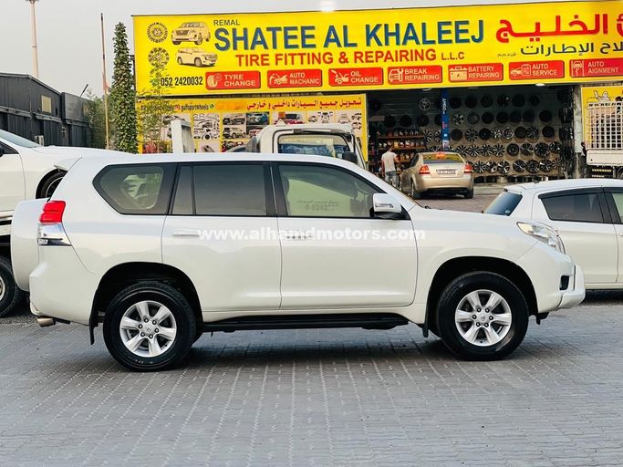Used Toyota Land Cruiser Prado 150 Series, 2.7 l, 2012 in Dubai by Alhamd Motors, White color. GCC Specs | AUTO.AE