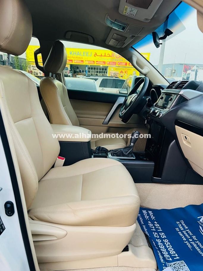 Used Toyota Land Cruiser Prado 150 Series Facelift 1, 2.7 l, 2015 in Dubai by Alhamd Motors, White color. GCC Specs | AUTO.AE