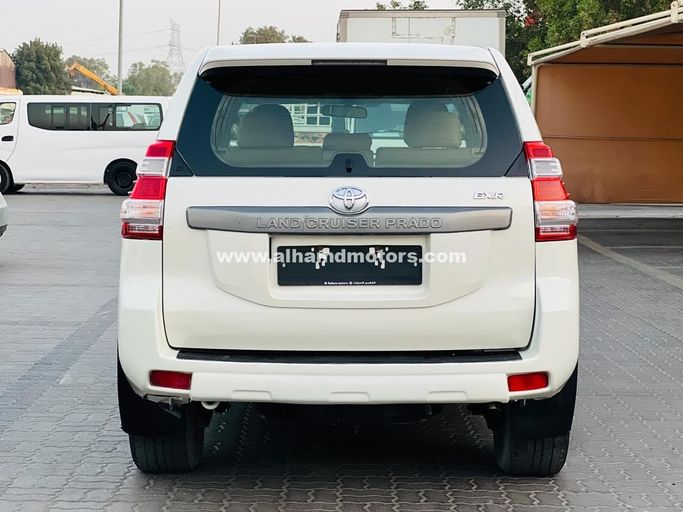 Used Toyota Land Cruiser Prado 150 Series Facelift 1, 2.7 l, 2015 in Dubai by Alhamd Motors, White color. GCC Specs | AUTO.AE