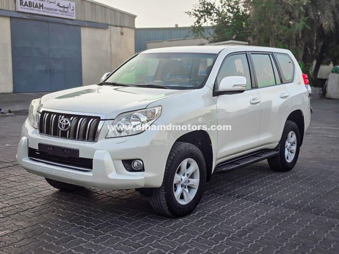 Used Toyota Land Cruiser Prado 150 Series, 2.7 l, 2011 in Dubai by Alhamd Motors, White color. GCC Specs | AUTO.AE