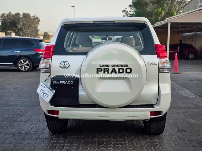Used Toyota Land Cruiser Prado 150 Series, 2.7 l, 2011 in Dubai by Alhamd Motors, White color. GCC Specs | AUTO.AE