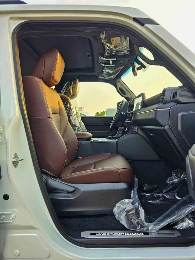 New Toyota Land Cruiser Prado 250 Series, 2.8 l, 2025 in Dubai by SK Motors, White color. GCC Specs | AUTO.AE