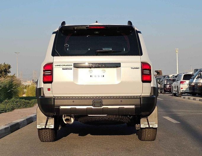 New Toyota Land Cruiser Prado 250 Series, 2.8 l, 2025 in Dubai by SK Motors, White color. GCC Specs | AUTO.AE
