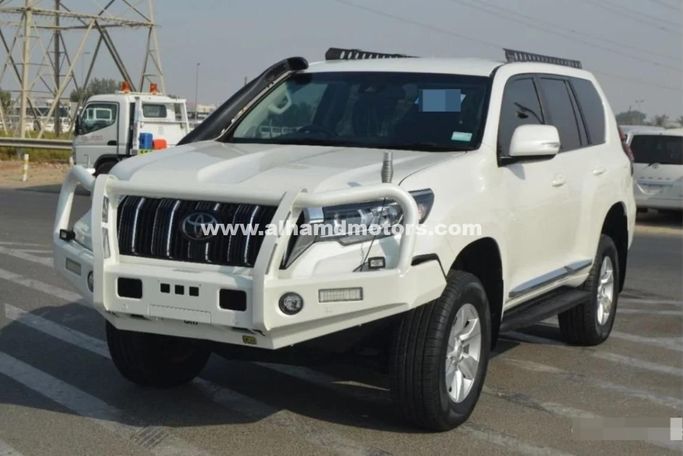 Подержанный Toyota Land Cruiser Prado 150 Series Рестайлинг 2, 2.8 л, 2018 в Дубае от Alhamd Motors Белый цвет. Other | AUTO.AE