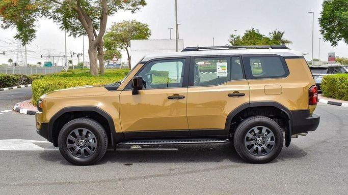 New Toyota Land Cruiser Prado 250 Series, 2.4 l, 2024 in Dubai by Najem Motors, Golden color. GCC Specs | AUTO.AE