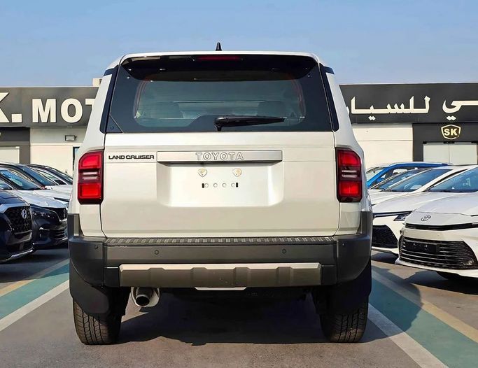 New Toyota Land Cruiser Prado 250 Series, 2.7 l, 2024 in Dubai by SK Motors, White color. GCC Specs | AUTO.AE