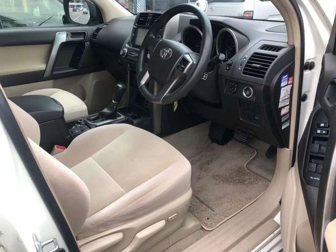 New Toyota Land Cruiser Prado 150 Series, 2.7 l, 2009 in Dubai by SK Motors, White color. Japanese Specs | AUTO.AE