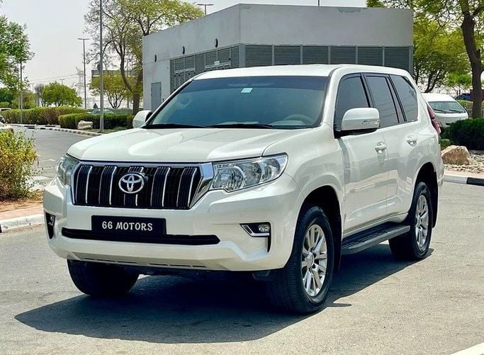 Used Toyota Land Cruiser Prado 150 Series Facelift 3, 4.0 l, 2021 in Dubai by 66 Motors, White color. GCC Specs | AUTO.AE