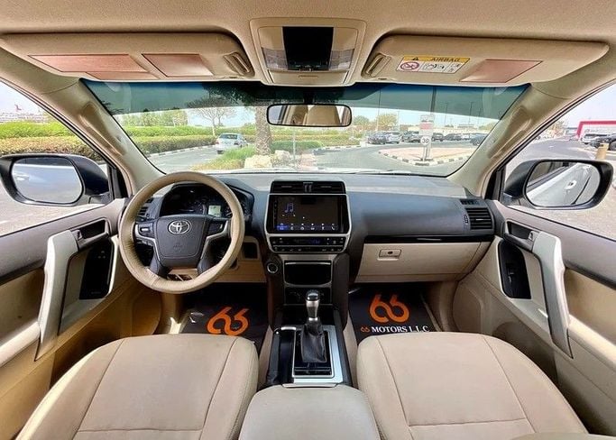 Used Toyota Land Cruiser Prado 150 Series Facelift 3, 4.0 l, 2021 in Dubai by 66 Motors, White color. GCC Specs | AUTO.AE