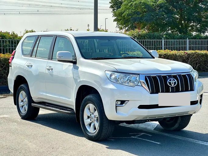 Used Toyota Land Cruiser Prado 150 Series Facelift 2, 2.7 l, 2019 in Dubai by Verified Hub Used Automobile Trading LLC, White color. GCC Specs | AUTO.AE