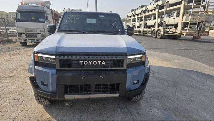 Новый Toyota Land Cruiser Prado 250 Series, 2.4 л, 2024 в Дубае от Rhodium Motors FZE Синий цвет. Европейская | AUTO.AE