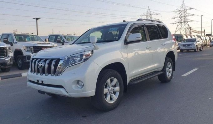 Подержанный Toyota Land Cruiser Prado 150 Series Рестайлинг 1, 2.8 л, 2016 в Дубае от Central Motors Белый цвет.  | AUTO.AE