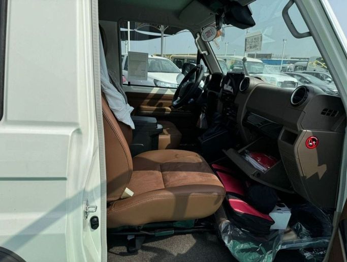 New Toyota Land Cruiser 70 Series Facelift 2, 4.0 l, 2024 in Dubai by Mohamed Hakim Motors, White color. GCC Specs | AUTO.AE