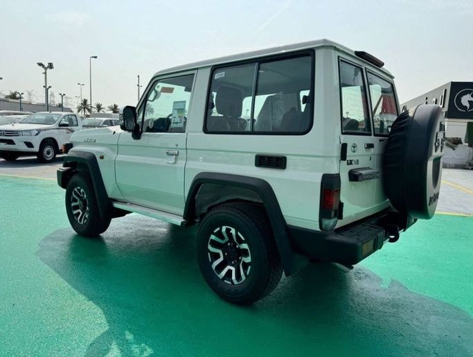 New Toyota Land Cruiser 70 Series Facelift 2, 4.0 l, 2024 in Dubai by Mohamed Hakim Motors, White color. GCC Specs | AUTO.AE