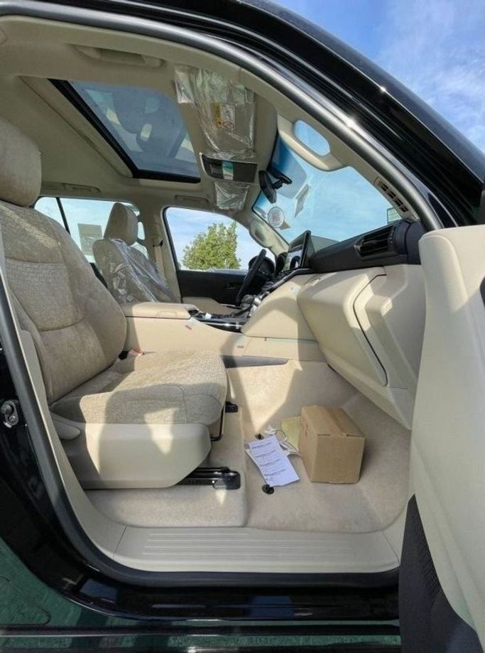 New Toyota Land Cruiser 300 Series, 3.4 l, 2023 in Dubai by Mohamed Hakim Motors, White color. GCC Specs | AUTO.AE