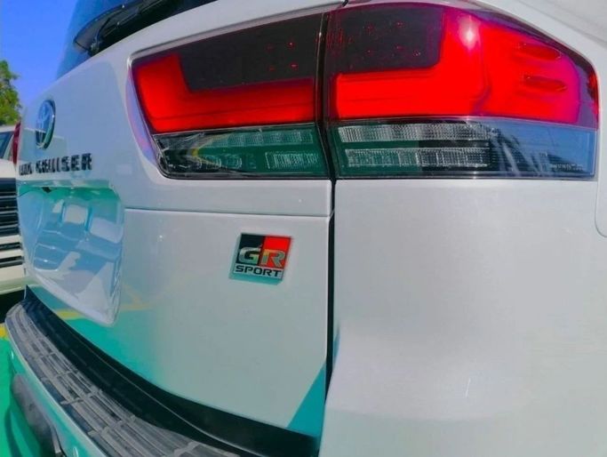 New Toyota Land Cruiser 300 Series, 3.4 l, 2023 in Dubai by Mohamed Hakim Motors, White color. GCC Specs | AUTO.AE