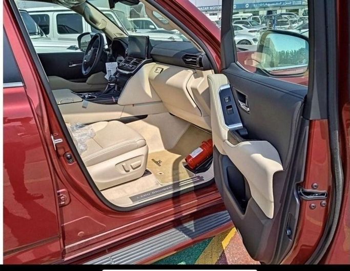 New Toyota Land Cruiser 300 Series, 3.3 l, 2023 in Dubai by Mohamed Hakim Motors, Red color. GCC Specs | AUTO.AE