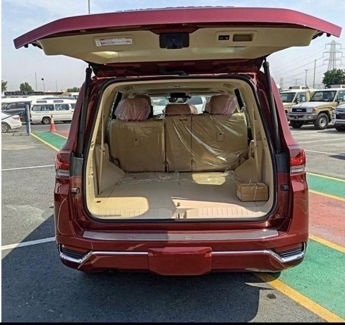 New Toyota Land Cruiser 300 Series, 3.3 l, 2023 in Dubai by Mohamed Hakim Motors, Red color. GCC Specs | AUTO.AE