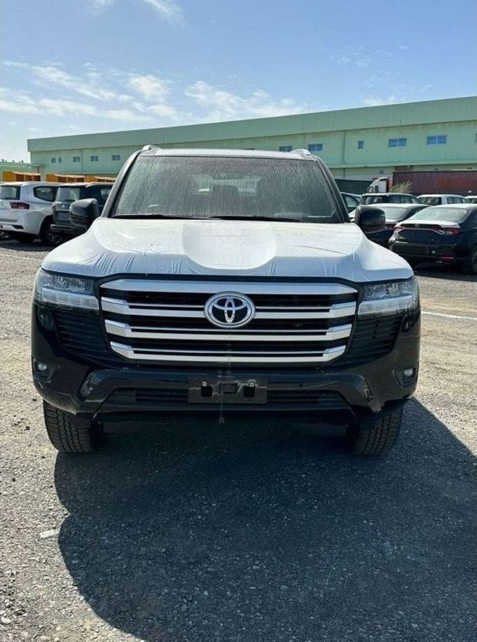 New Toyota Land Cruiser 300 Series, 3.4 l, 2023 in Dubai by Mohamed Hakim Motors, Black color. GCC Specs | AUTO.AE