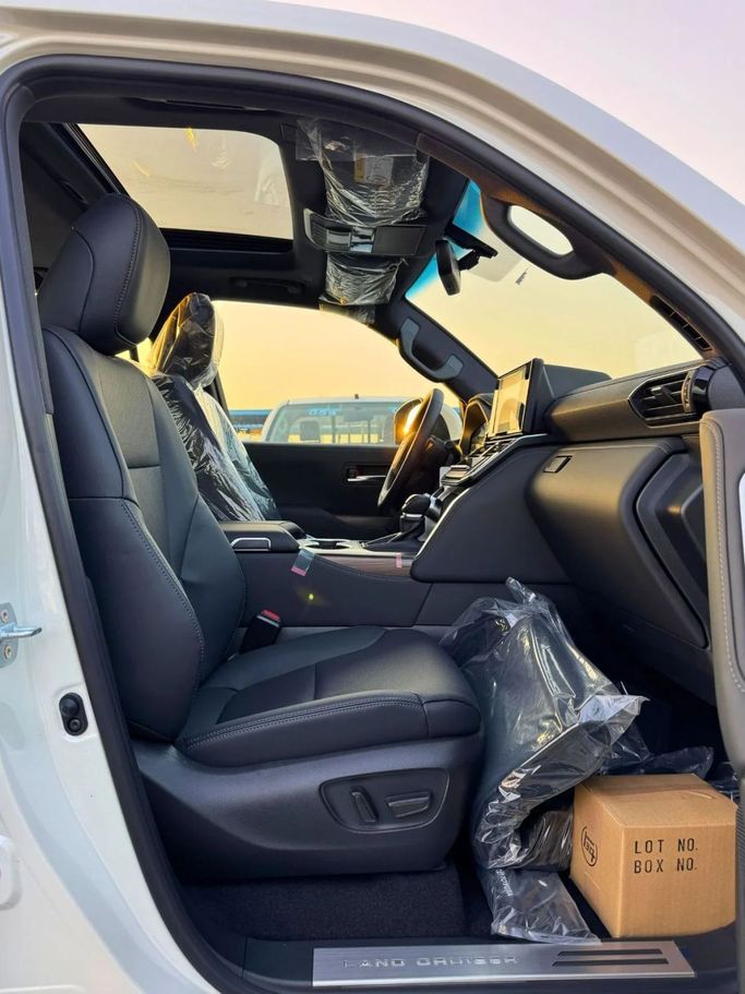 New Toyota Land Cruiser 300 Series, 4.0 l, 2025 in Dubai by SK Motors, White color. GCC Specs | AUTO.AE