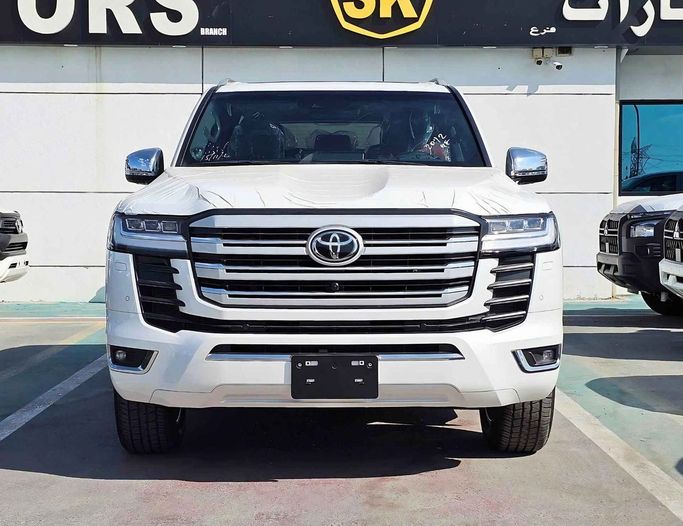 New Toyota Land Cruiser 300 Series, 3.3 l, 2024 in Dubai by SK Motors, White color. GCC Specs | AUTO.AE