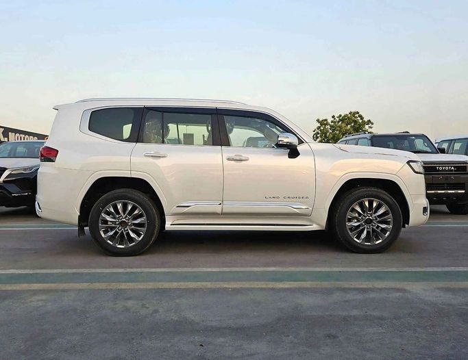 New Toyota Land Cruiser 300 Series, 3.4 l, 2024 in Dubai by SK Motors, White color. GCC Specs | AUTO.AE